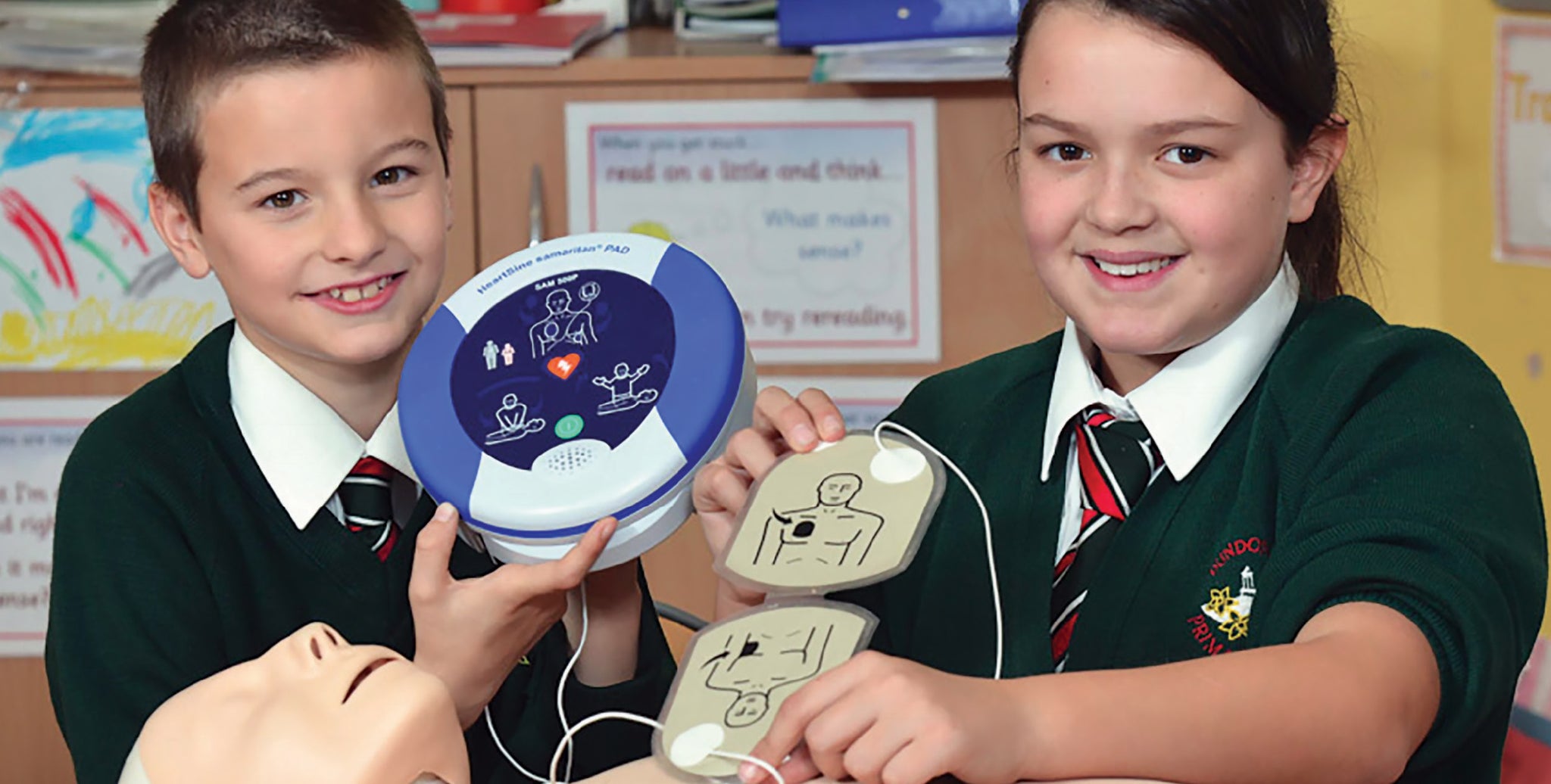 Children using a defibrillator 